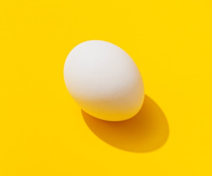 This is an egg with a yellow background color